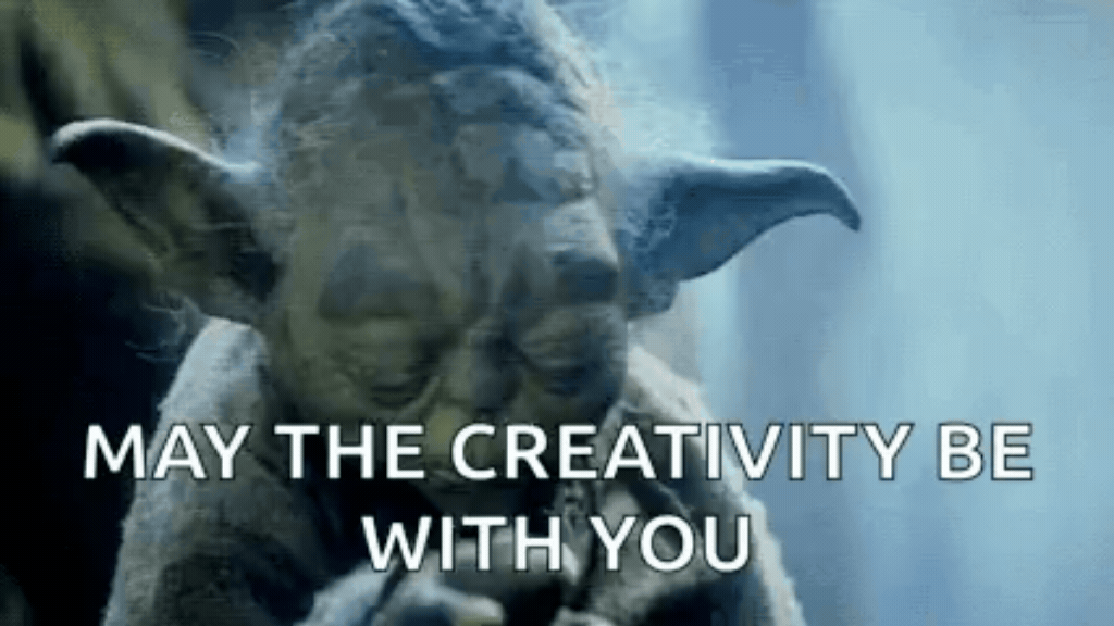 Uma imagem do Mestre Yoda, da saga Star Wars, com a legenda sobreposta em texto branco: 'MAY THE CREATIVITY BE WITH YOU'. O fundo é escuro e esfumaçado, evocando o universo Star Wars.